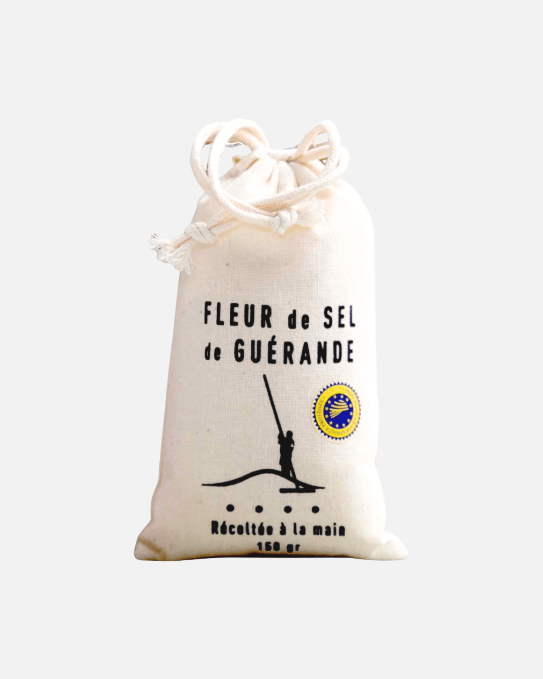 Ein weißer Baumwollbeutel mit Fleur de Sel de Guérande Meersalz von Artisans du Sel.