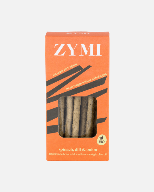 Orangefarbene Zymi-Verpackung von Bio-Brotstangen mit Spinat, Dill und Zwiebeln vor einem weißen Hintergrund.