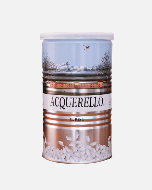 500g-Dose Acquerello Carnaroli Reis mit ikonischem Landschaftsmotiv, luftdicht verpackt und gereift für extra cremige Risotto-Textur.