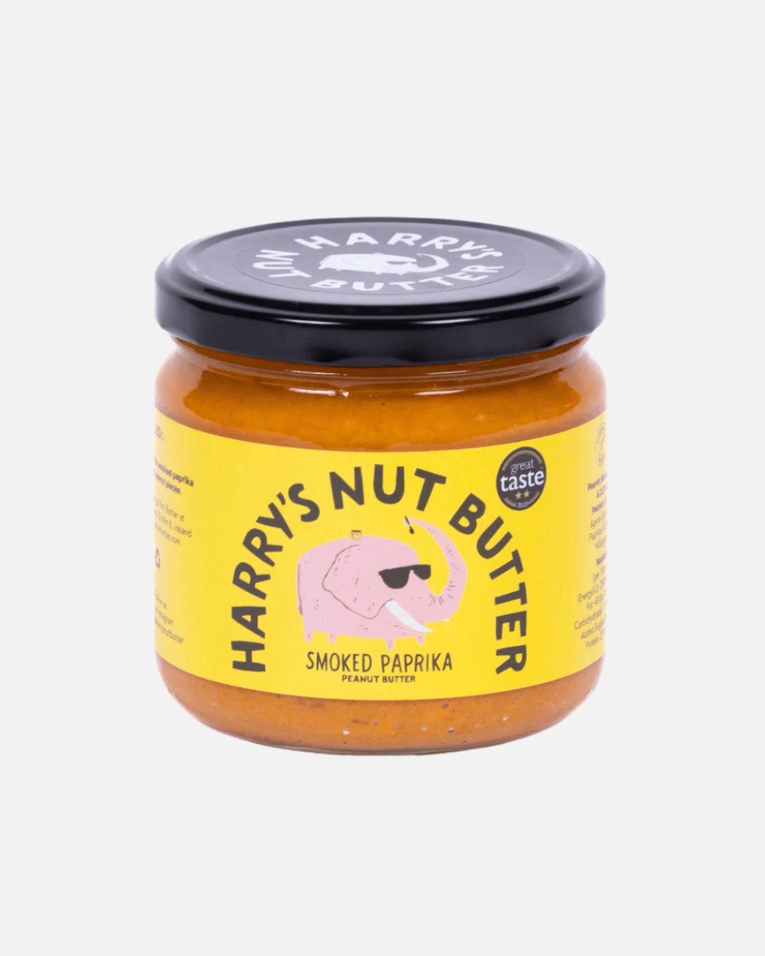 Glas Harry's Erdnussbutter mit geräuchertem Paprika, gelbes Etikett und schwarzer Deckel, vor weißem Hintergrund.