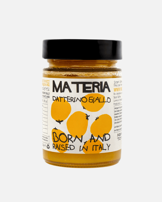 Ein Glas gelbe Tomatensauce Datterino Giallo von Materia mit gelben Tomaten auf dem Etikett.